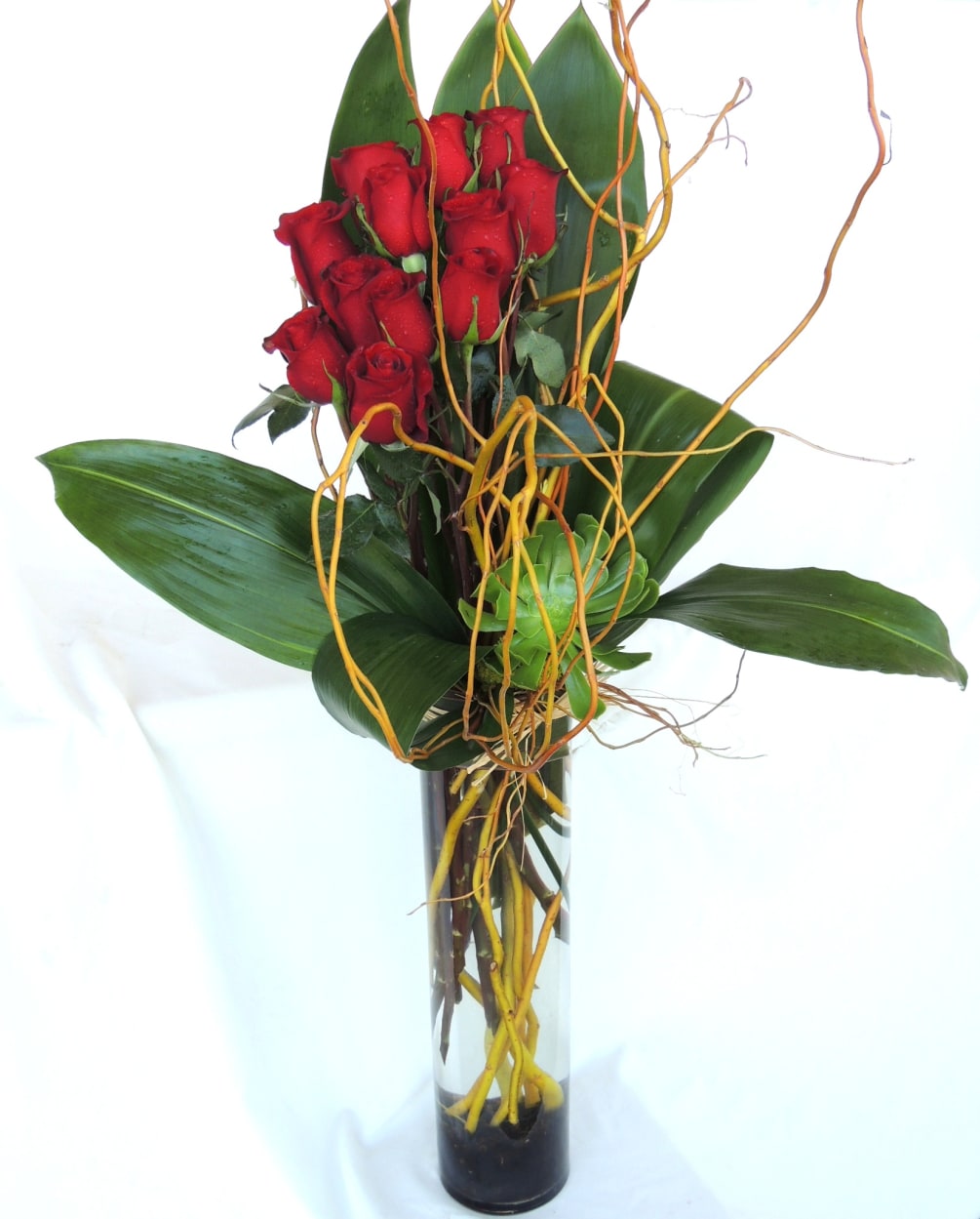 
Elevate your Valentine&#039;s Day celebration with our stunning tall arrangement, designed to