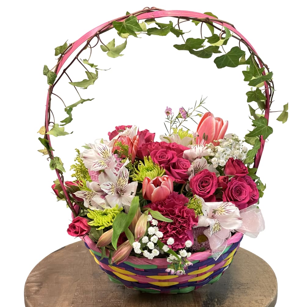 Surprise someone with a beautiful basket of colorful flowers. This cheerful array