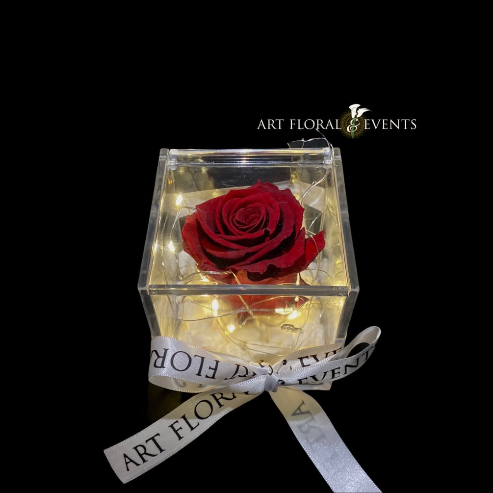 This natural rose lasts 1 year, encased in a clear acrylic box