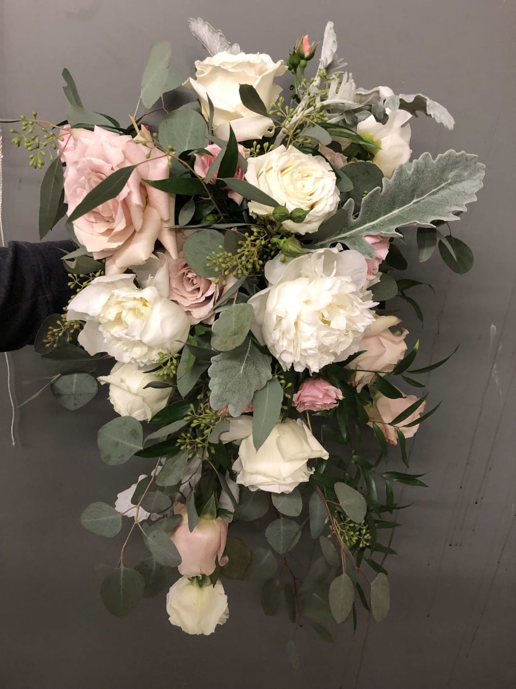 Brides Casading Bouquet Designed with Roses and Peonies
