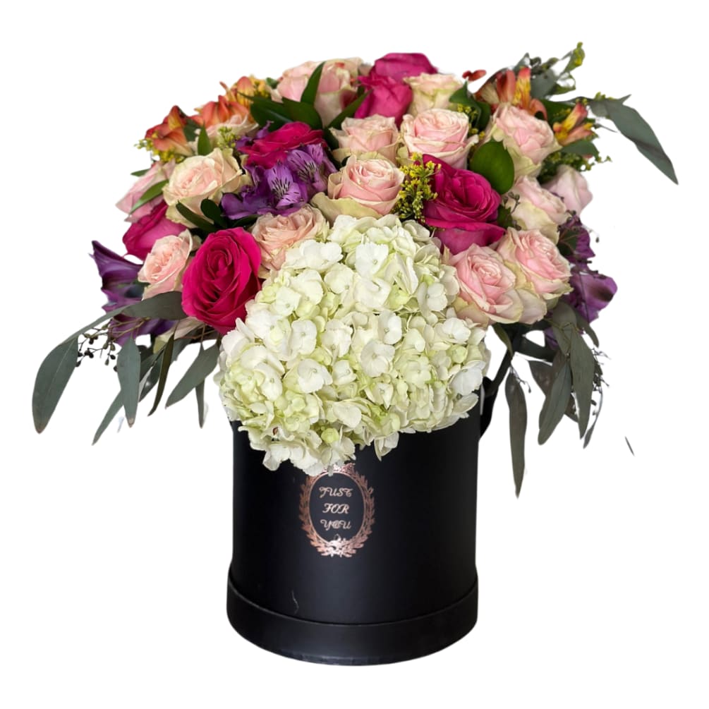 Colorful floral box to bring joy to a loved one. This gorgeous