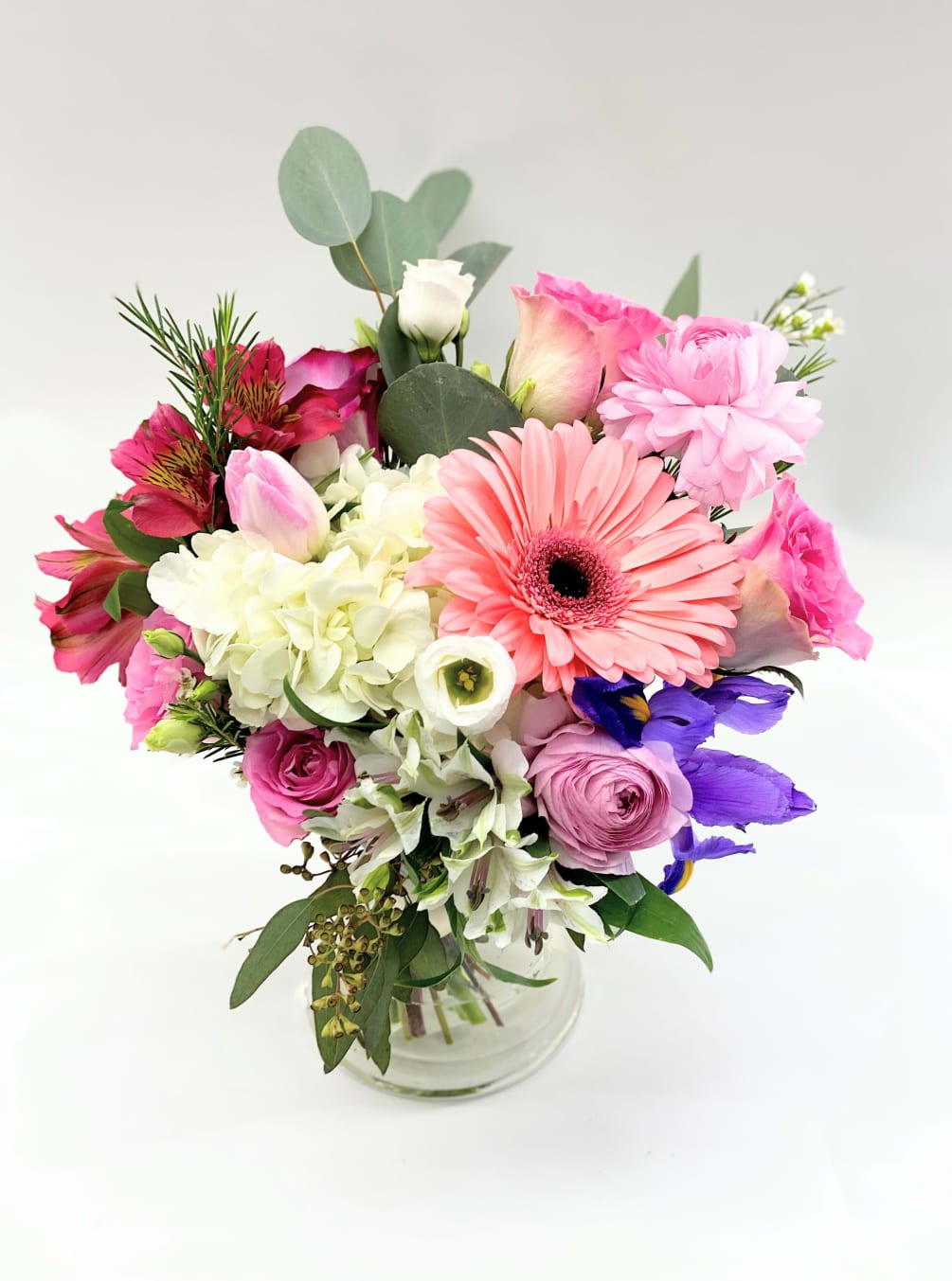 small mix flowers in pink color.Vase included.