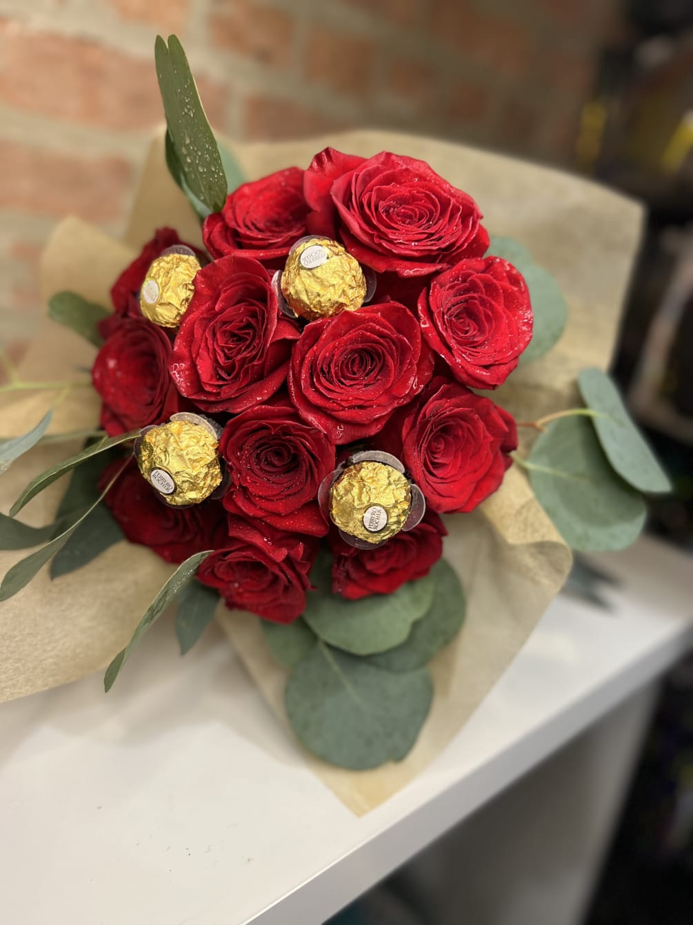 1 Dozen Red Roses Arranged Buchon Style with 4 Ferrero Roche Chocolates