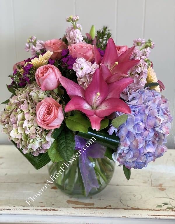 Wow them with this stunner...filled with roses, hydrangea, lilies and other beautiful