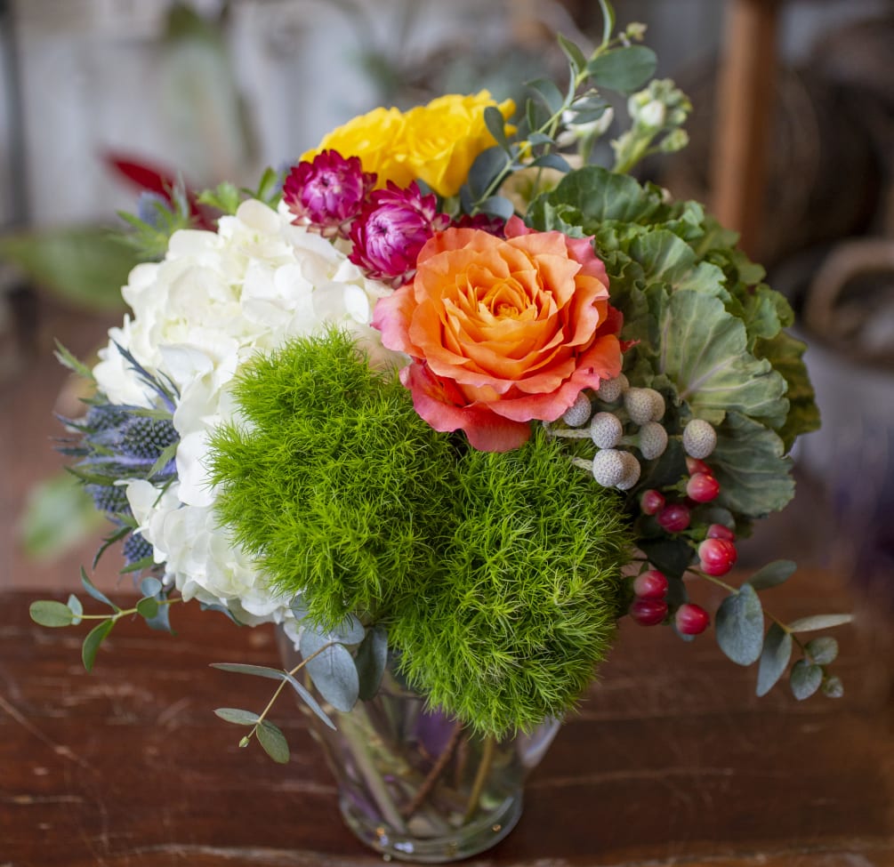 Sweet bunch of seasonal flowers with Hydrangea, Spray Roses and Kale in