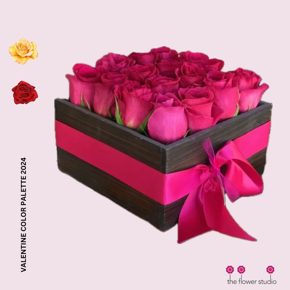 A beautiful wooden box and 16 premium hot pink clustered, to perfection.