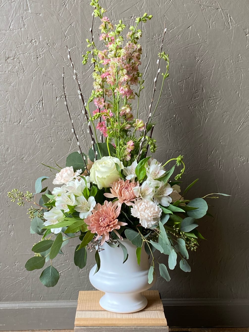 Beautiful shades of pink and white create a unique and gardeny arrangement
