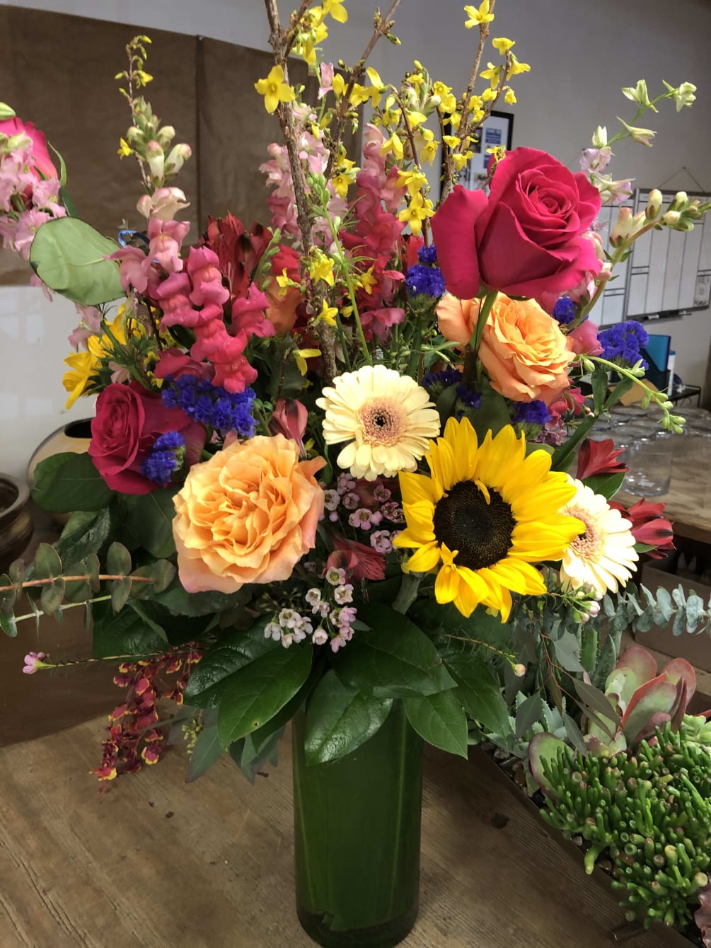 Roses, sunflowers, gerbera daisies and seasonal spring flowers are a perfect combination.