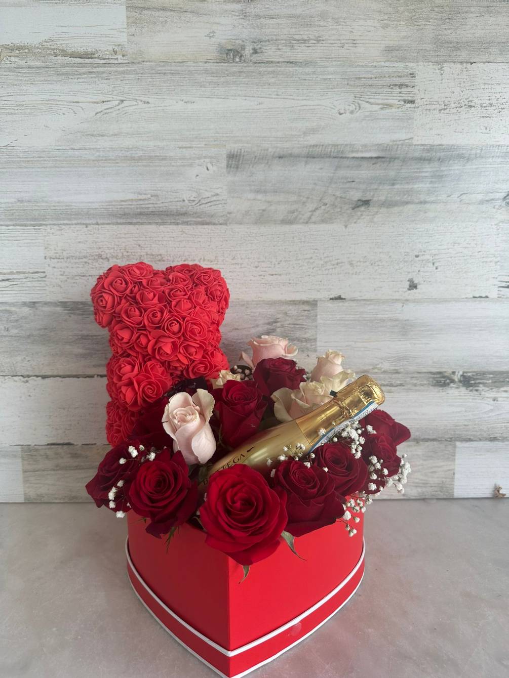 ROSES IN A HEART SHAPE WITH A FOAM ROSES BEAR AND A