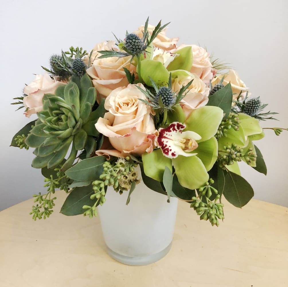 The color theme for this arrangement is rustic, rich in warm earth