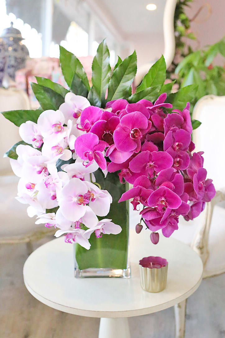 A scene-stealing floral design showcasing two cascades of equally exquisite phalaenopsis orchids