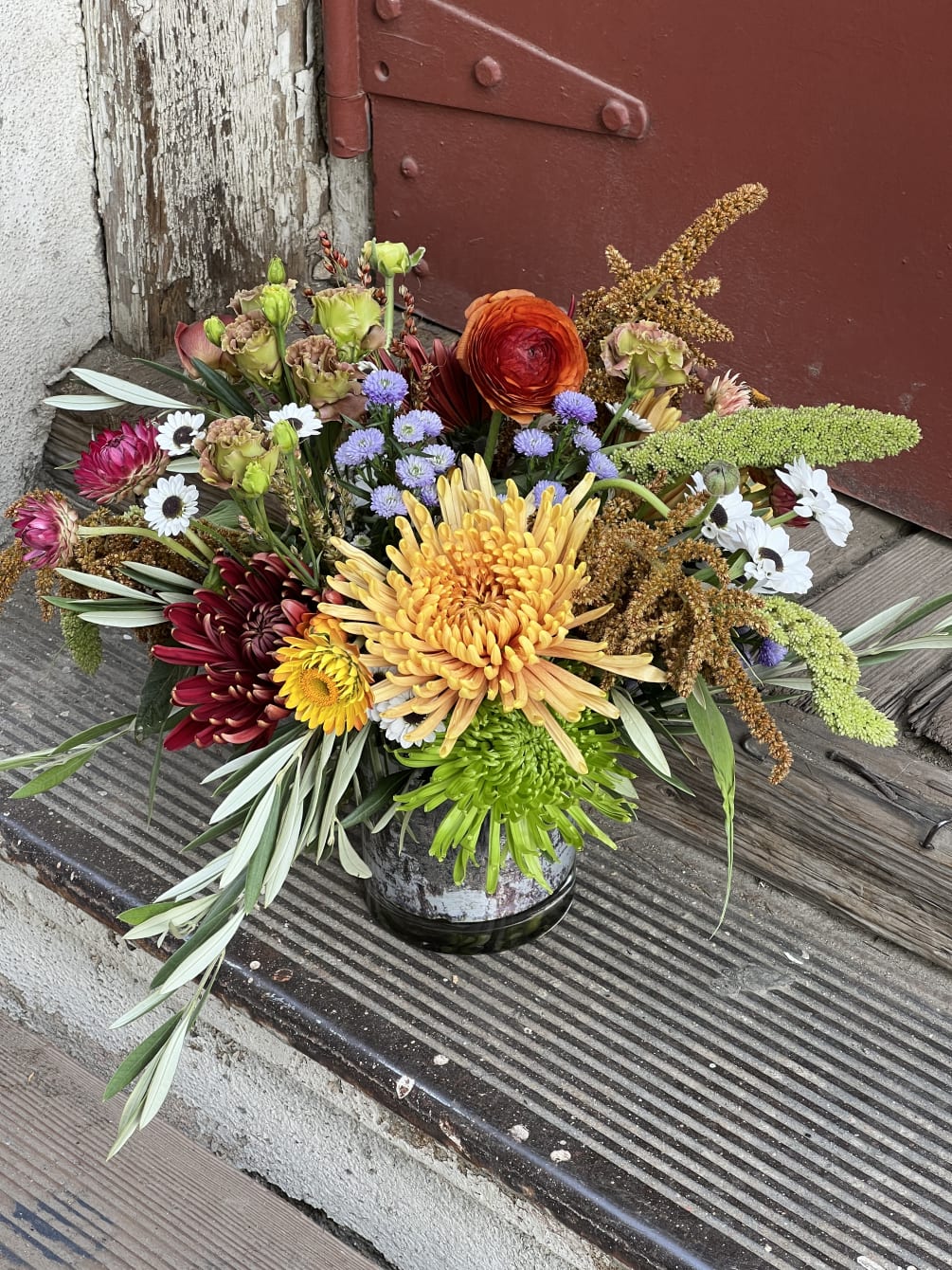 A low profile arrangement, with a taste of the season&#039;s freshest flowers.