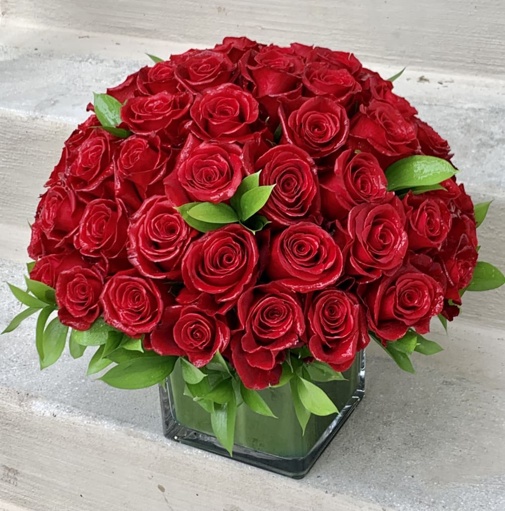 This arrangement include 50-65 roses in 6in glass vase. You have the