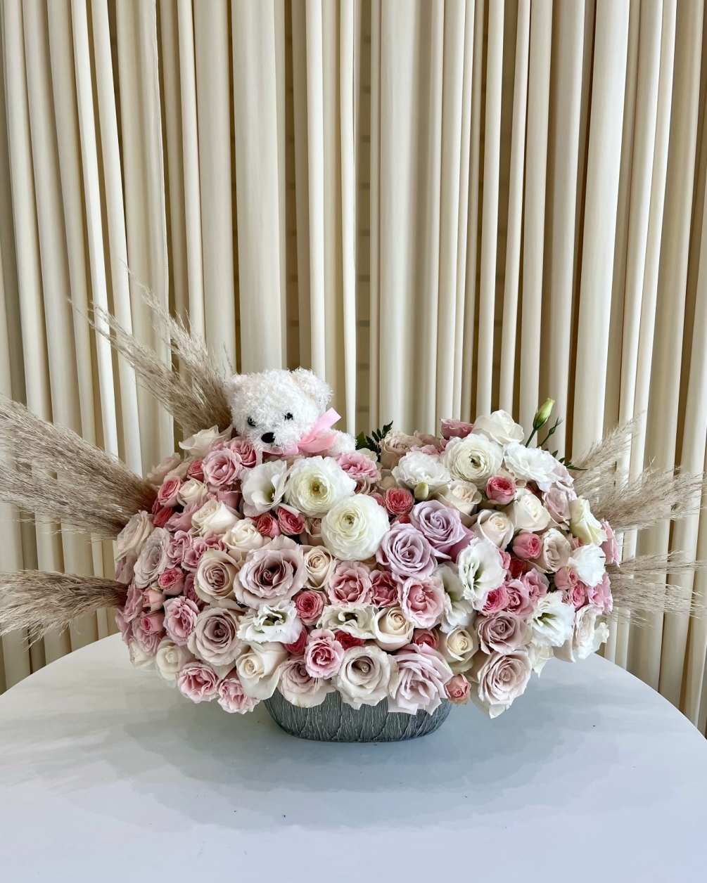 Welcome the newest bundle of joy with our &quot;Sweet Embrace&quot; floral arrangement