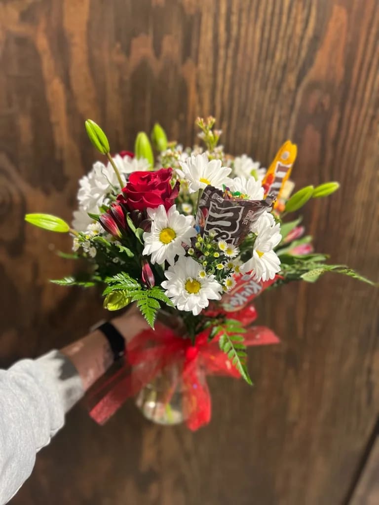 5 full size candy bars added into a flower arrangement! 