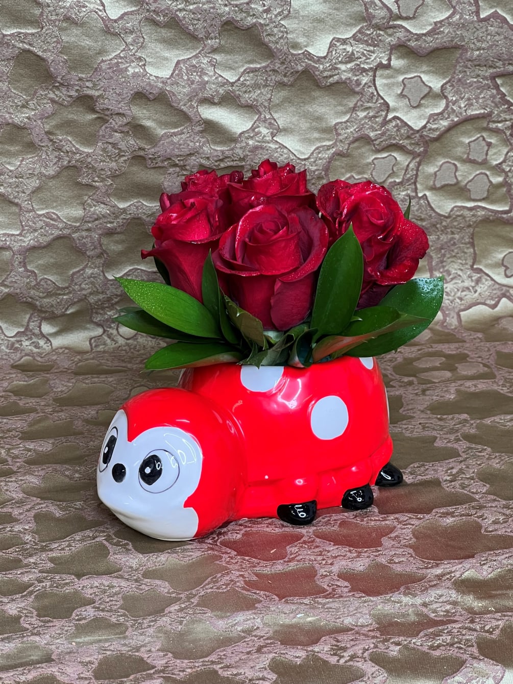 This cute Little Lady Bug will make anyone smile!  With imported