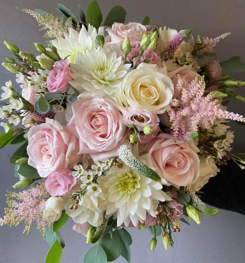 This Bridal bouquet is made up of beautiful dahlias and soft pink