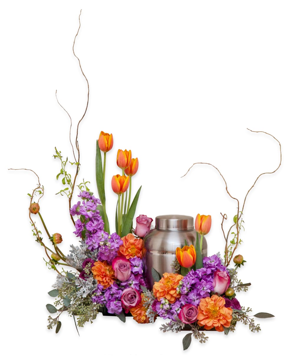 A pure and delicate expression of adoration. This arrangement of orange, lavender