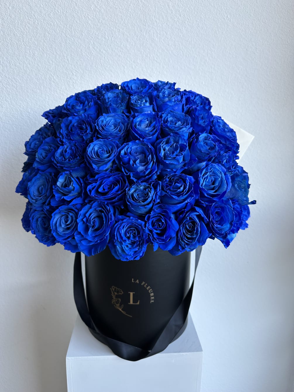 This beautiful arrangement filled with the royal blue roses to deliver your