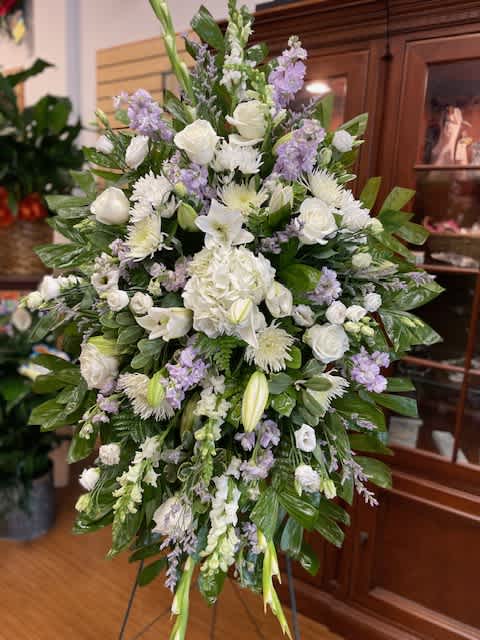 Lavender and white mixed flowers standing spray
