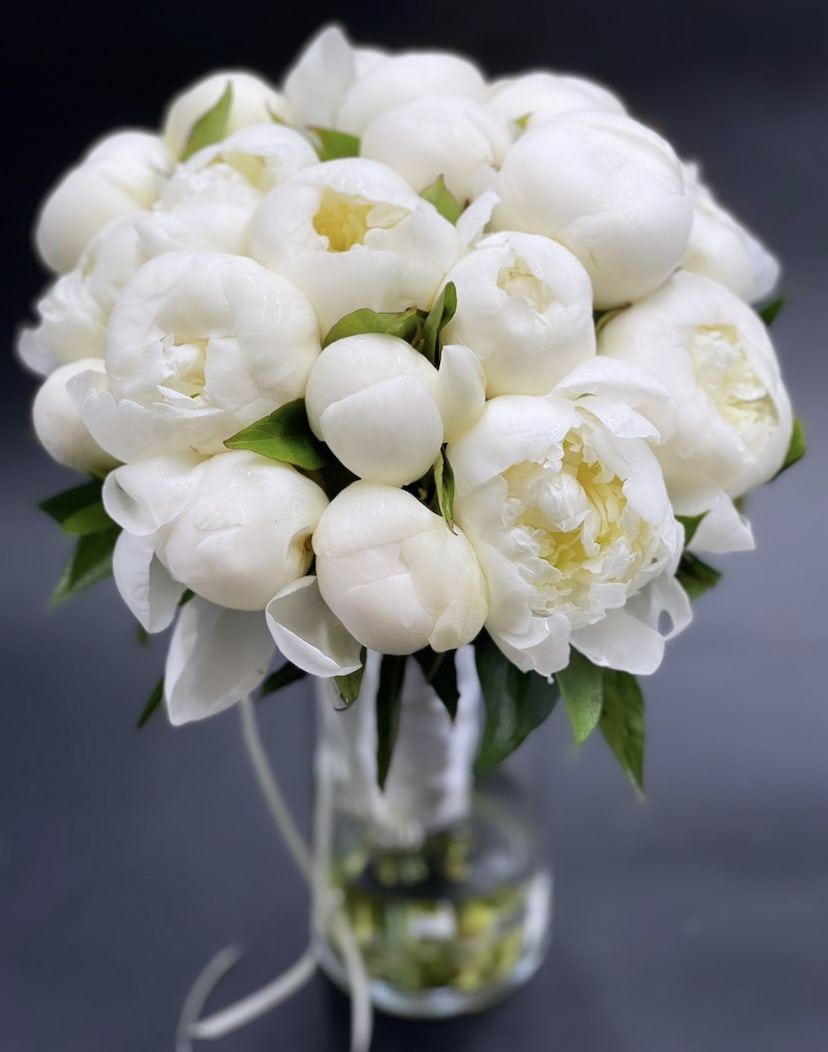 White bridal bouquet with peonies. Oh, how beautiful peonies look in the