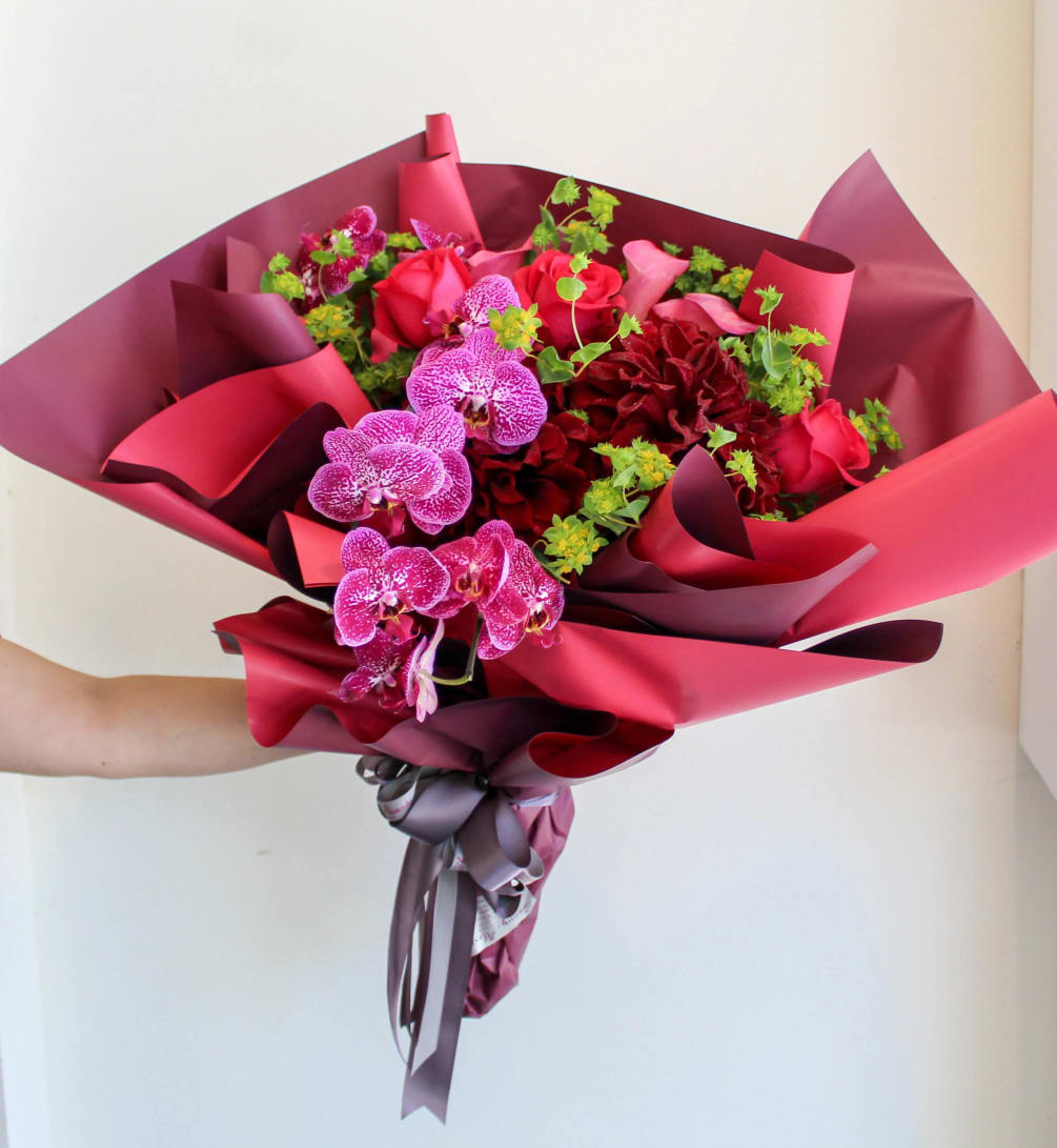 Let our talented designers create a custom wrap bouquet for your special
