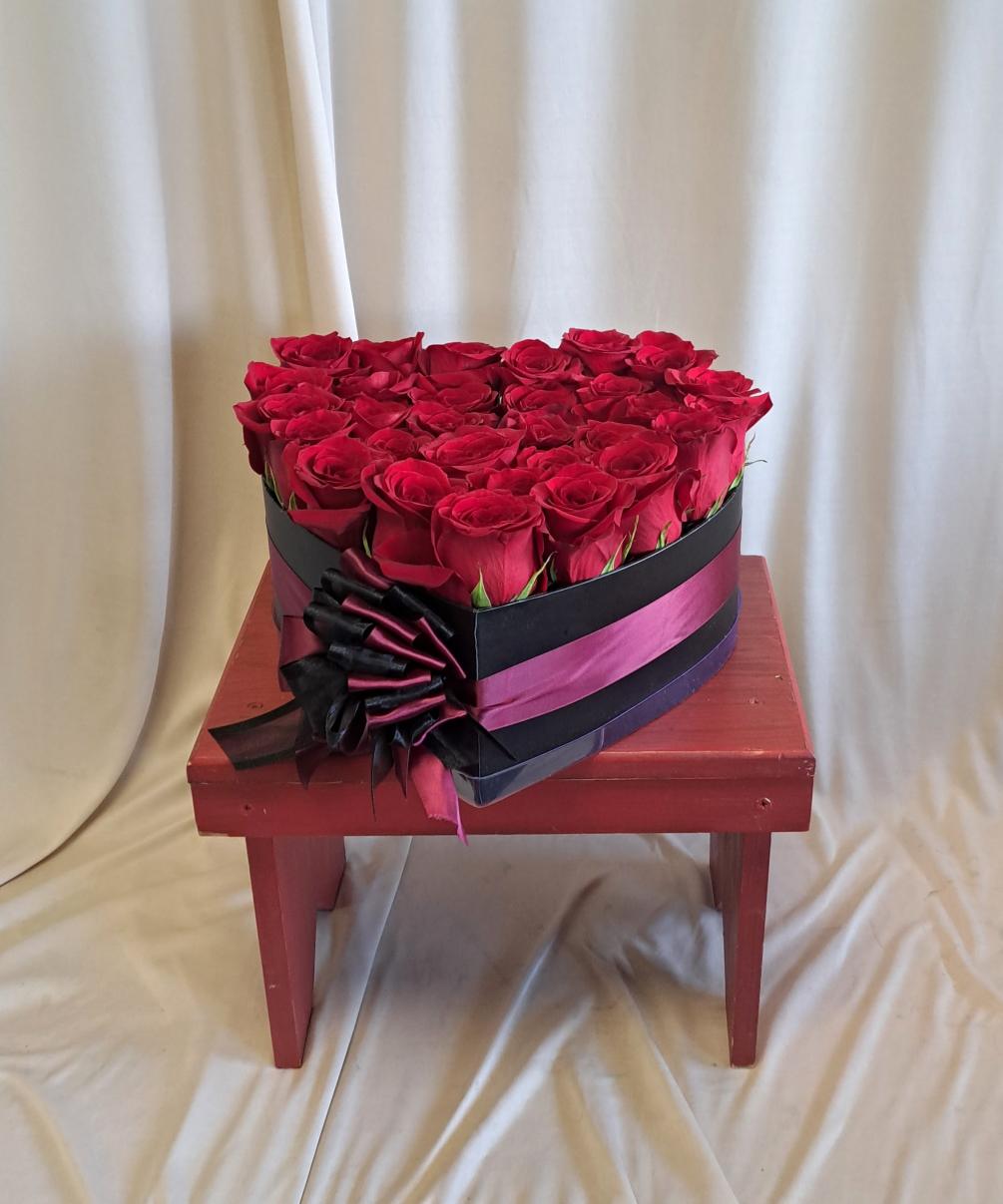 Darling box of red premium roses in a medium size box and