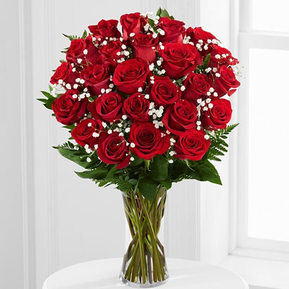 Product Information
Two Dozen Roses. A timeless classic in a high-quality glass vase