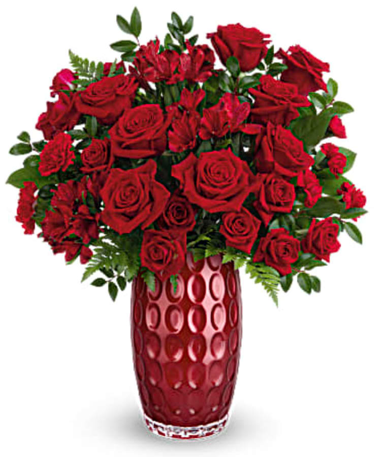 Red hot! Arranged with a ravishing all-red bouquet, this glass keepsake vase