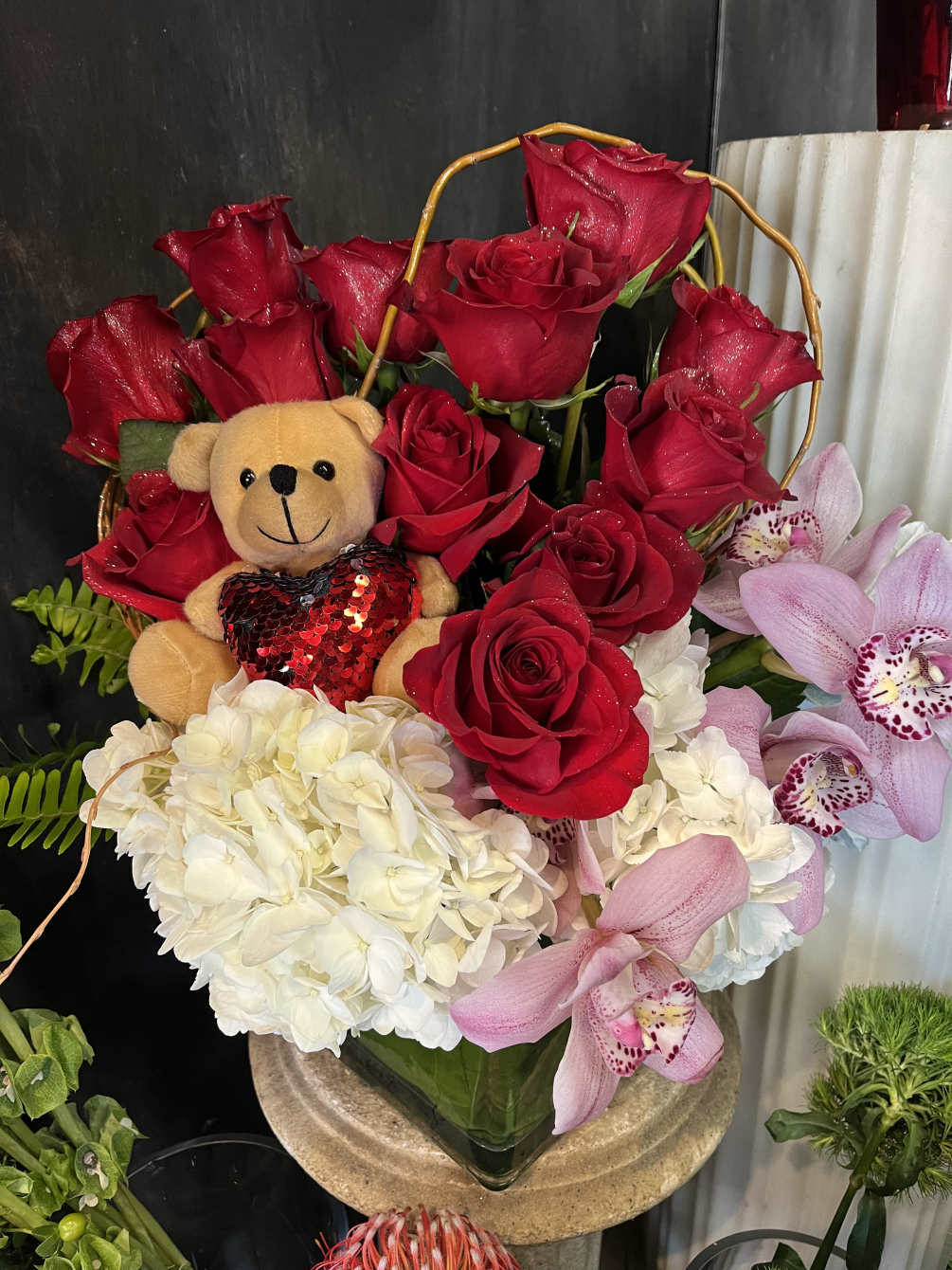 Red Rose Dozen with Hydrangeas , Orchids and a Heart Bear 