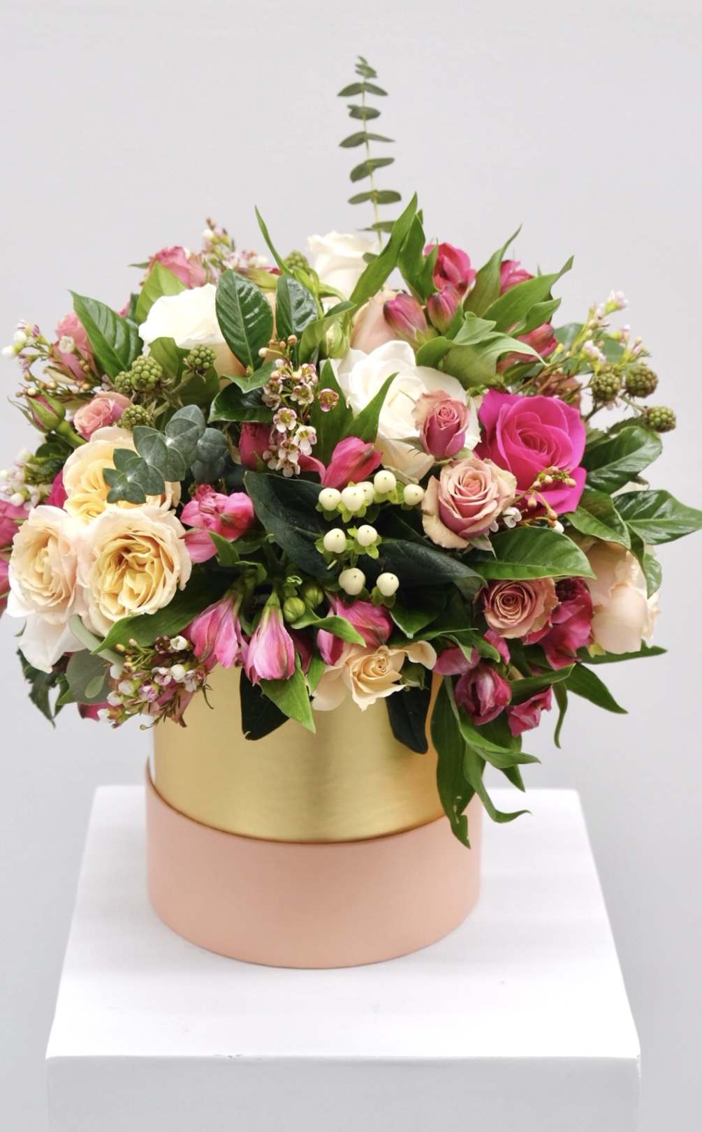 Gals just want to have fun with this garden style arrangement of