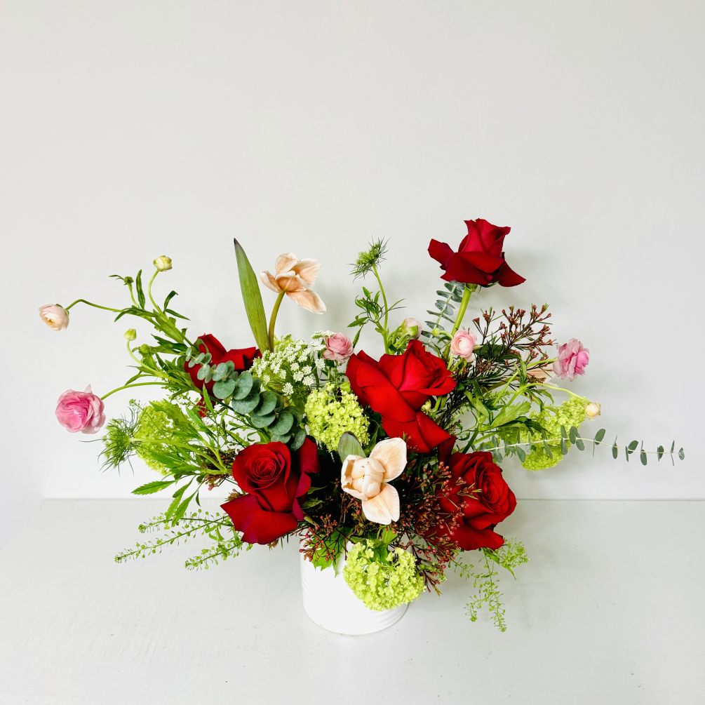 Indulge in the timeless elegance of our Valentine&#039;s custom arrangement featuring passionate