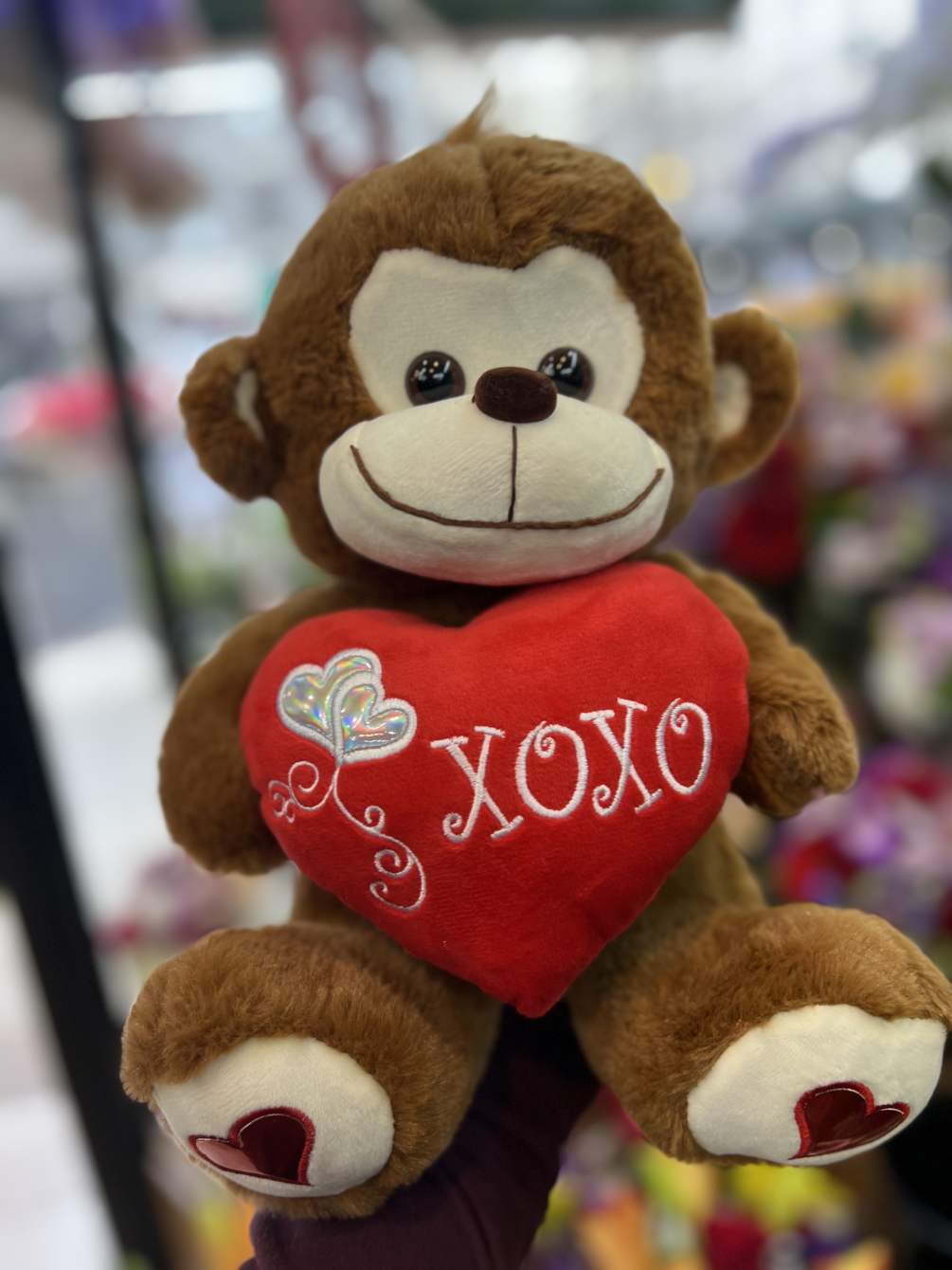 Red stuffed monkey top
