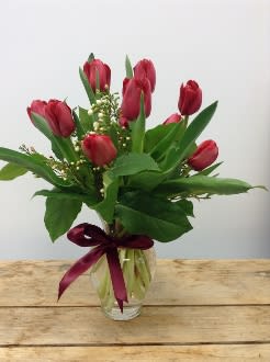 This beautiful tulip arrangement is $65 plus delivery, it comes in one