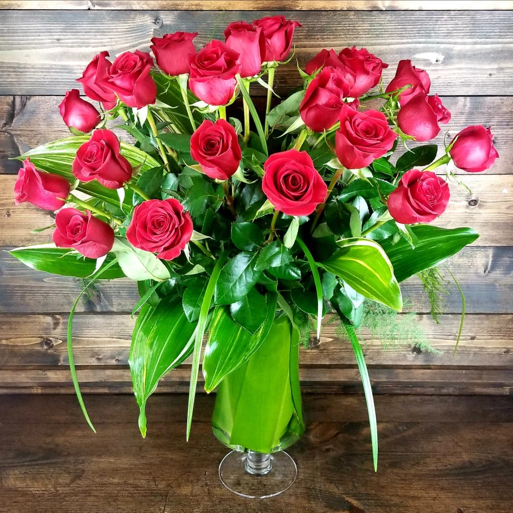 A traditional arrangement of two dozen Red Roses declare &quot;You are my