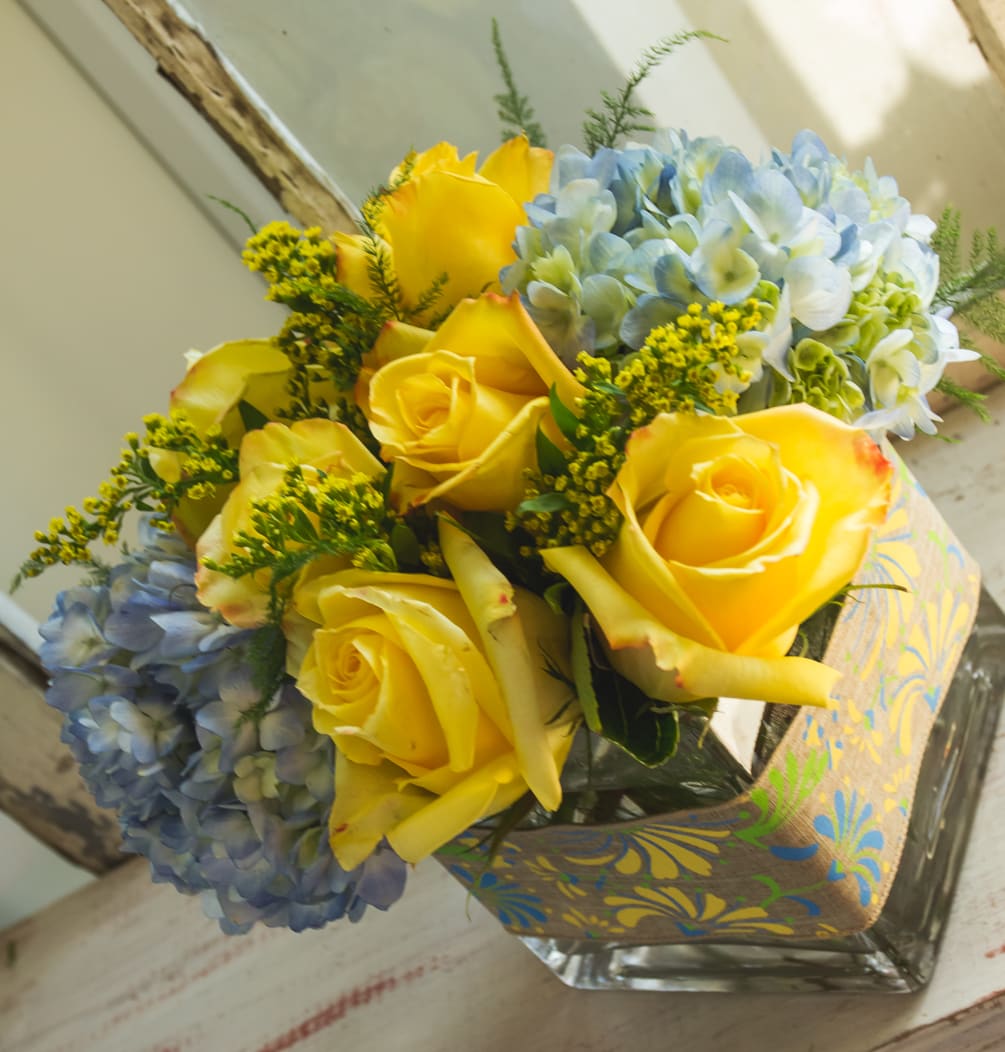 Yellow Roses and Hydrangea in a cube vase with ribbon.