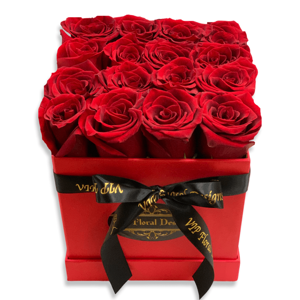 16 Red Roses with diamond pins arranged in our signature hat flower