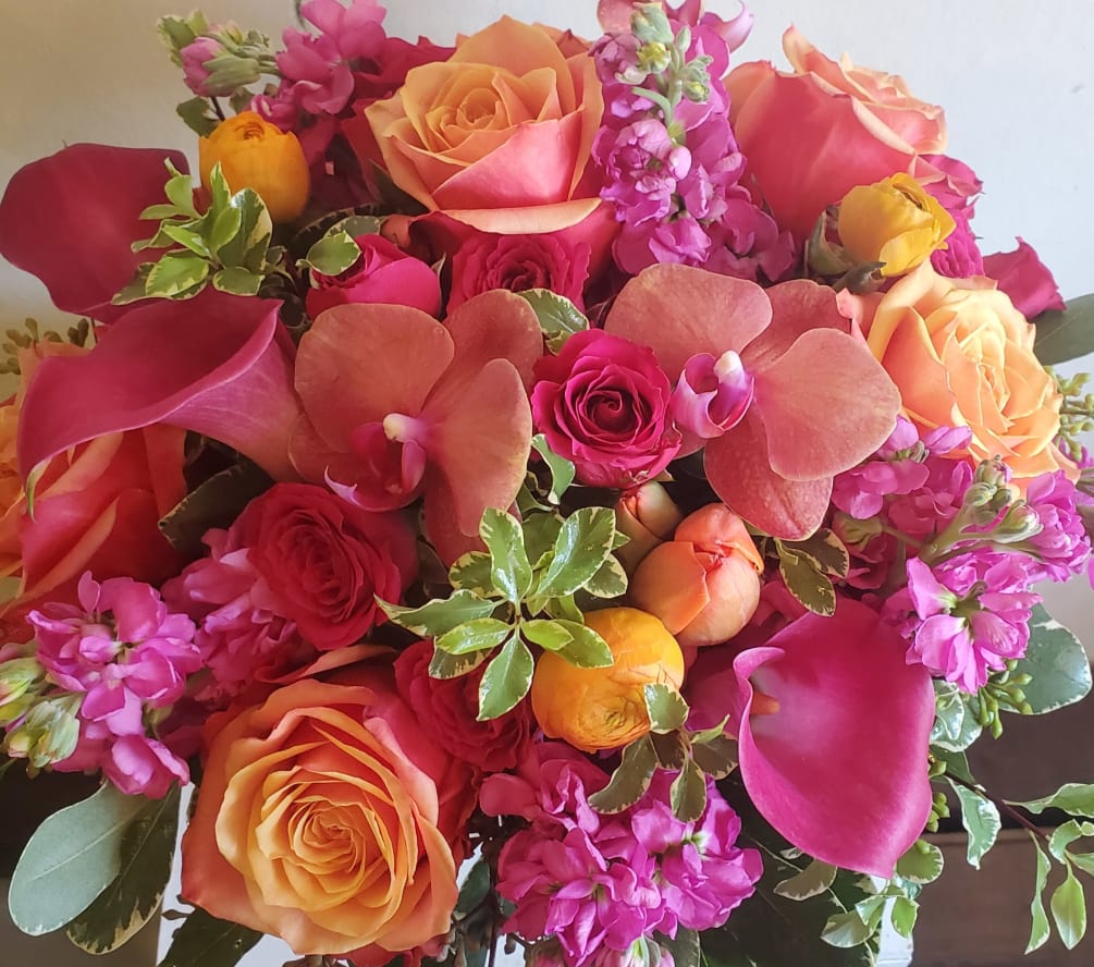 A mixture of bright raspberry pinks and tangerine oranges. 