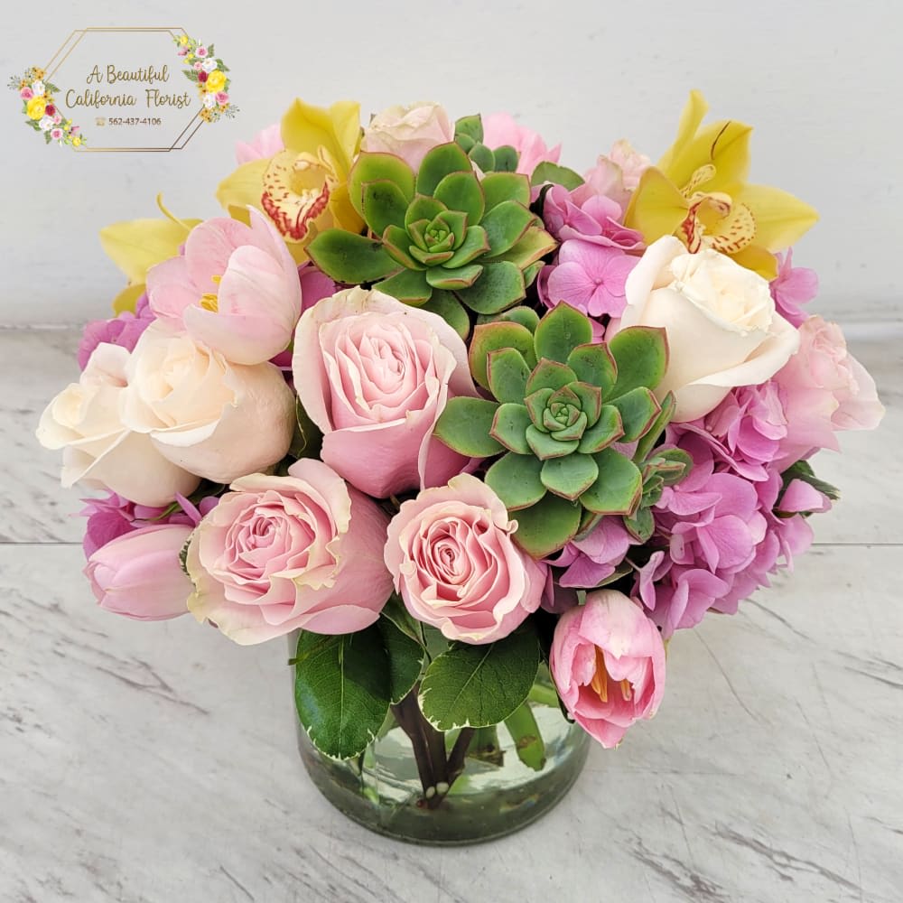 Lush Life
This is a low and lush floral arrangement of pink and