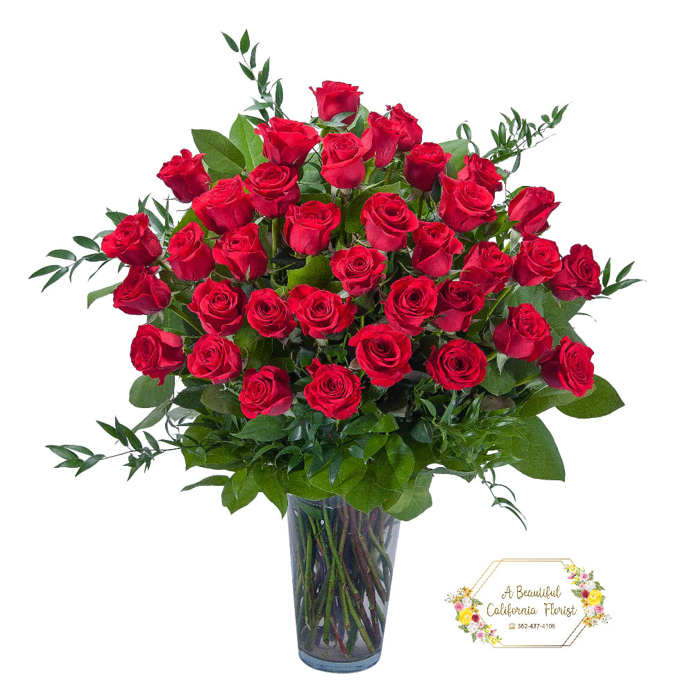 Beautiful arrangement of Three Dozen (36) long stem RED roses arranged in