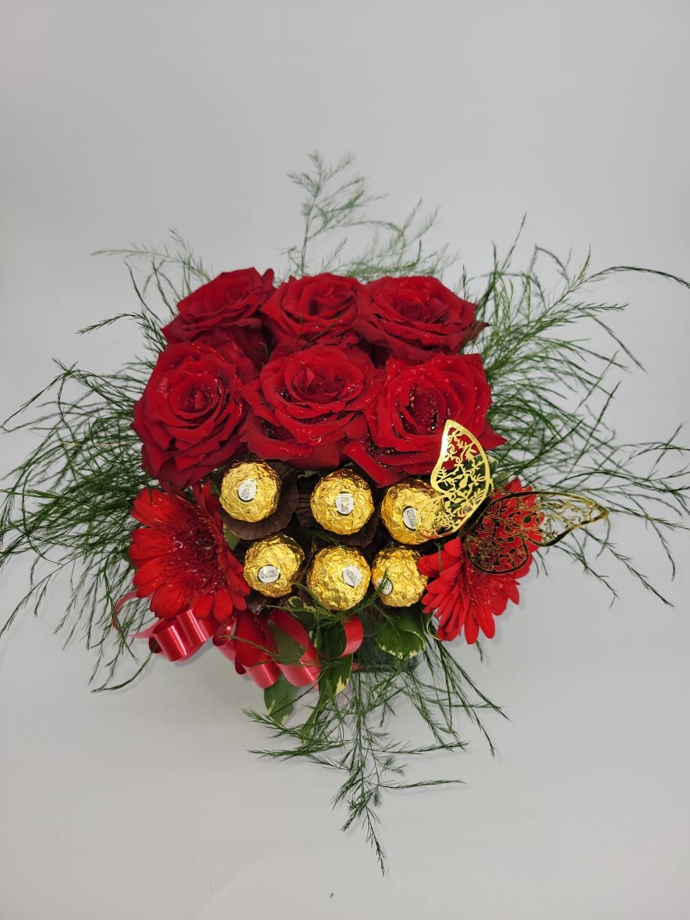 Roses ,Gerbera and chocolates 