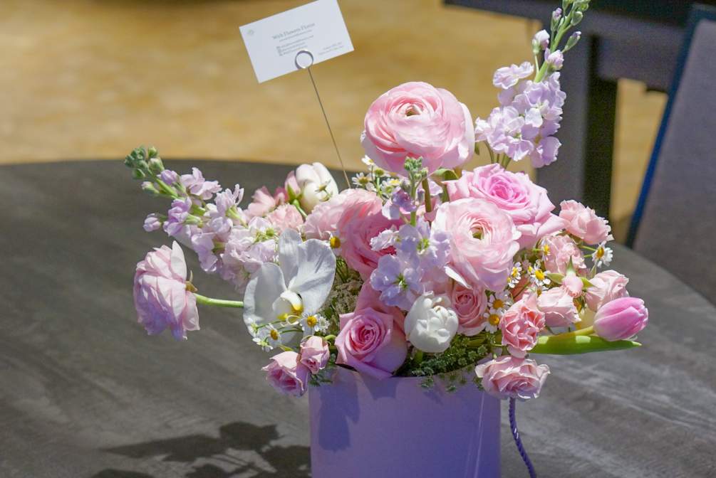 Luxury pink flower arrangement in round box