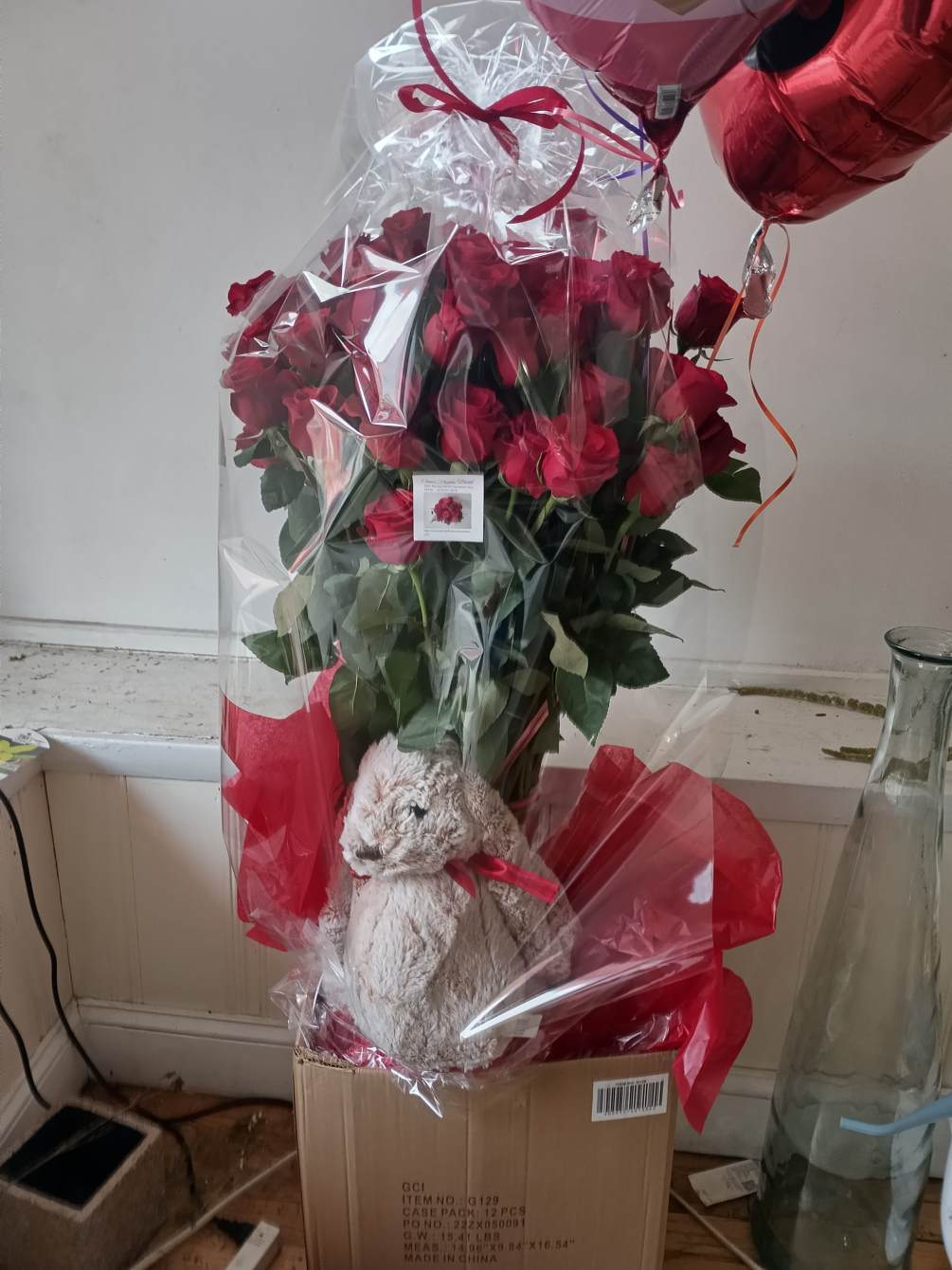 Beautiful 60&quot; red roses in a tall vase with large plush beige