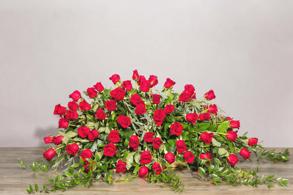 A blend of gorgeous red flowers that have a colorful richness that