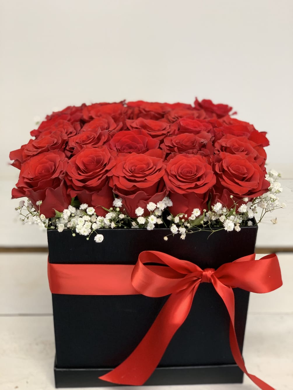 Send love a big box of 25 red roses also available in