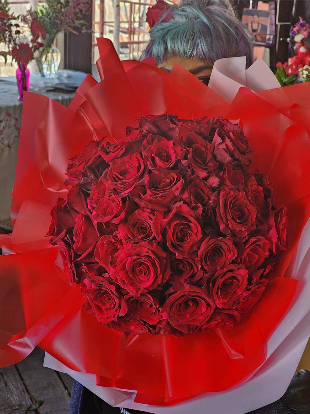 50 Red Roses wrapped - &quot;Unconditional Love.&quot;
Deluxe - 99 Roses - &quot;I