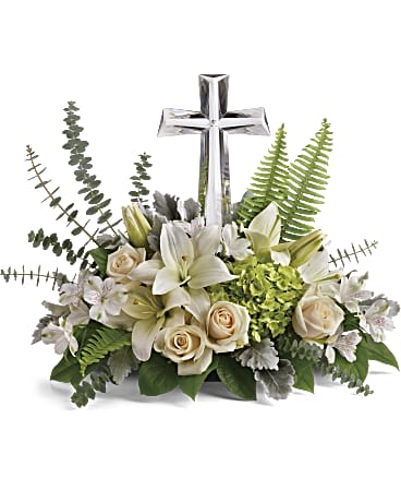 This reverant bouquet of serene white flowers is a beautiful sharing of
