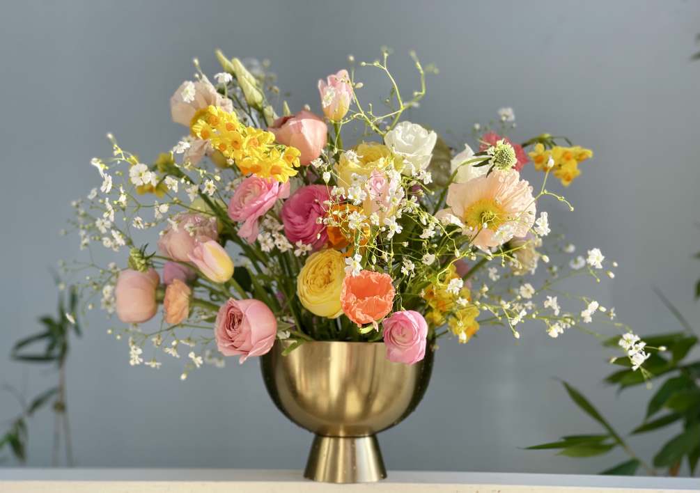 A whimsical gorgeous design filled with pastels of poppies, and garden roses