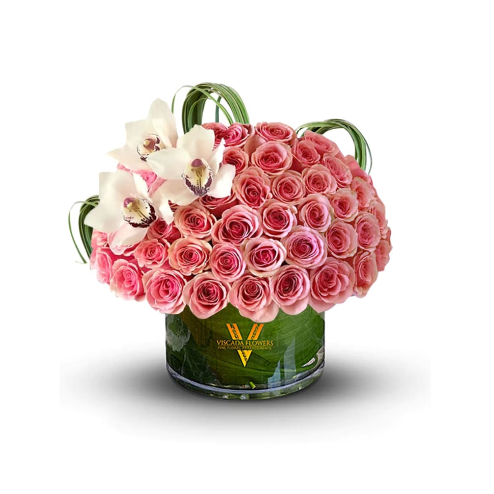 Peach and cream-colored blossoms blend harmoniously in this soft, dreamy arrangement. The