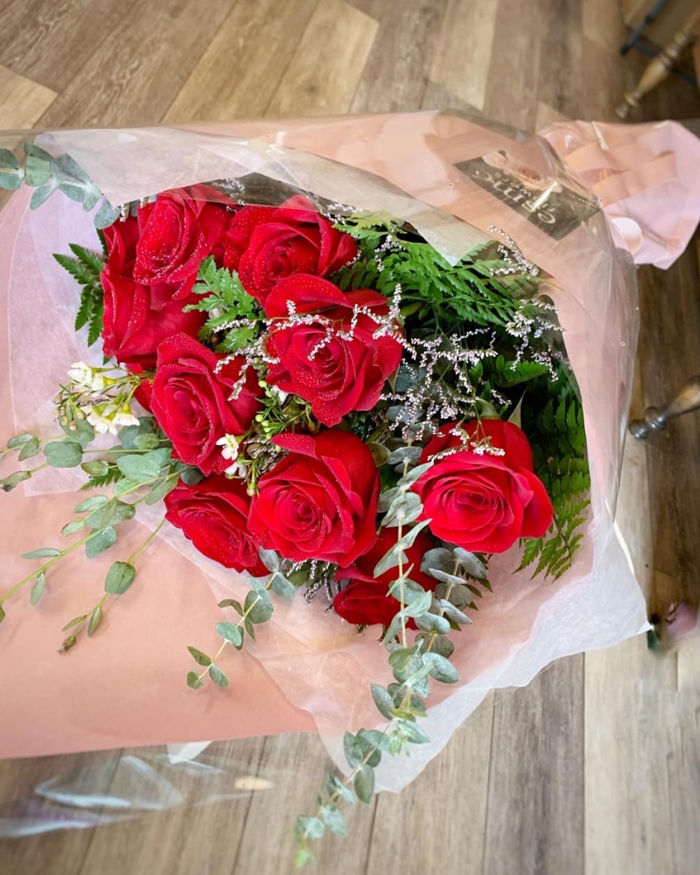 A beautiful hand wrapped arrangement of premium long stem red roses.

-STANDARD: 12